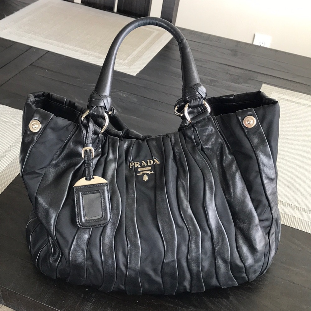 Authentic Prada leather and nylon rushed bag